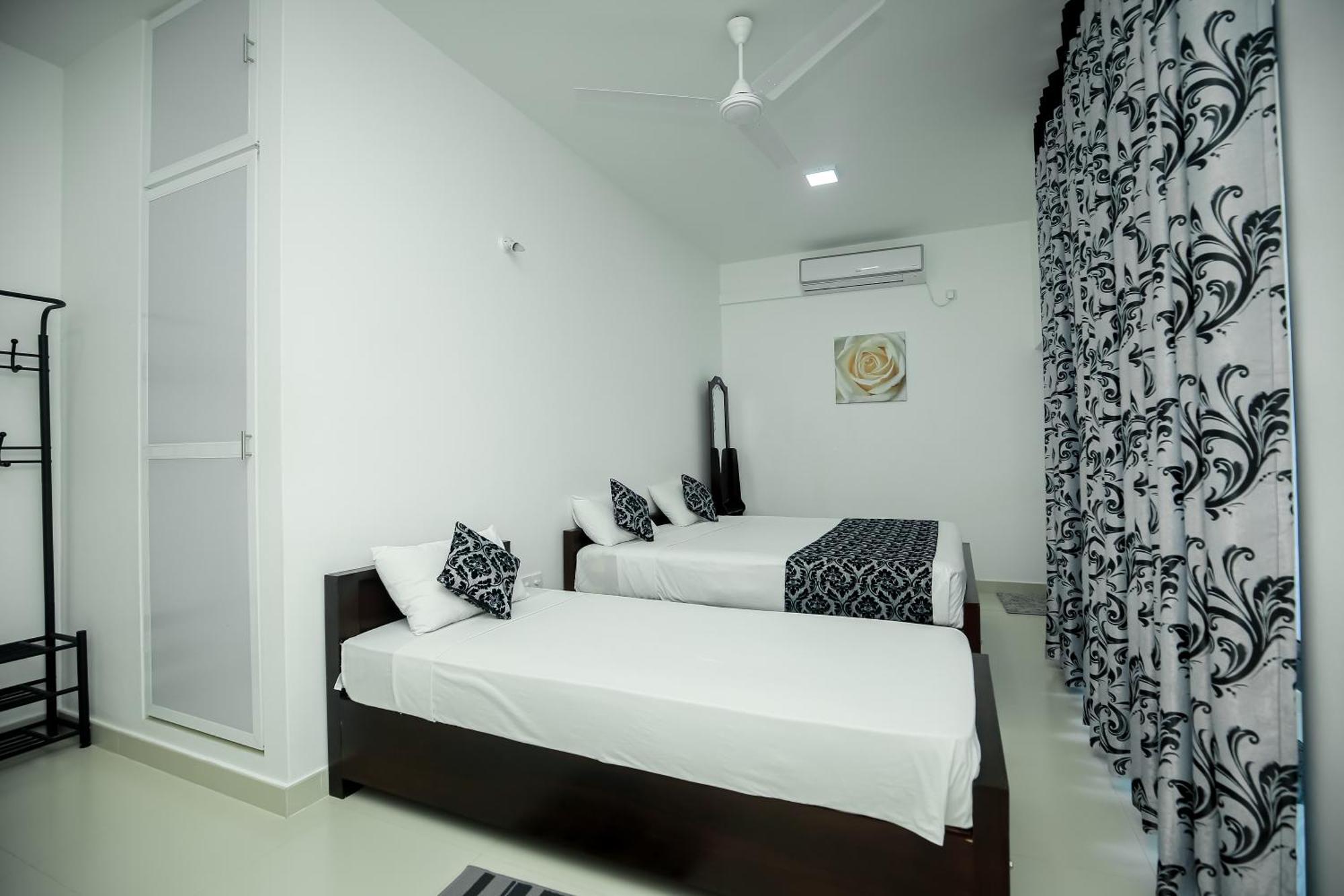 Roabaa Guesthouse Batticaloa Habitación foto